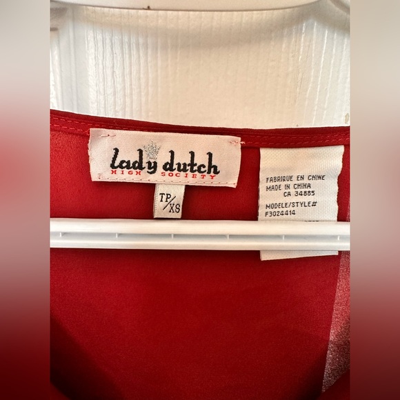 Merlot colored top can be dressed up or down. Beautiful bead detail - Picture 2 of 3